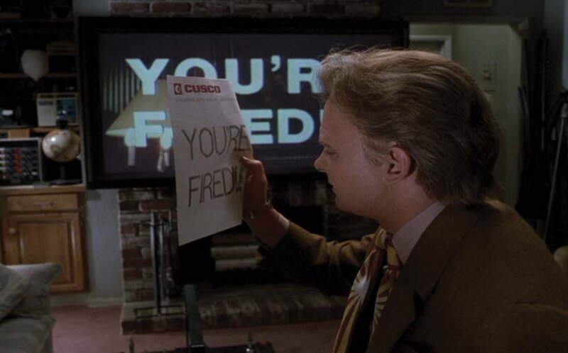 Man Holding Sign — Brown