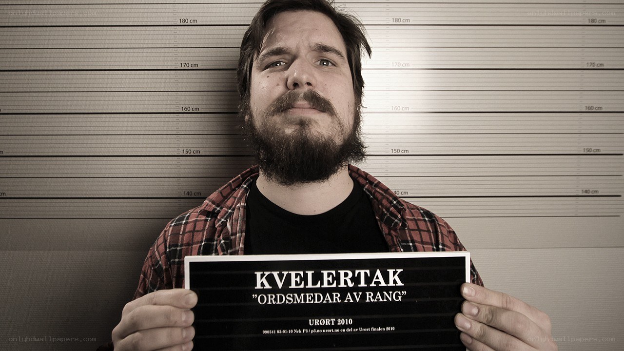 Man holding sign in mugshot
