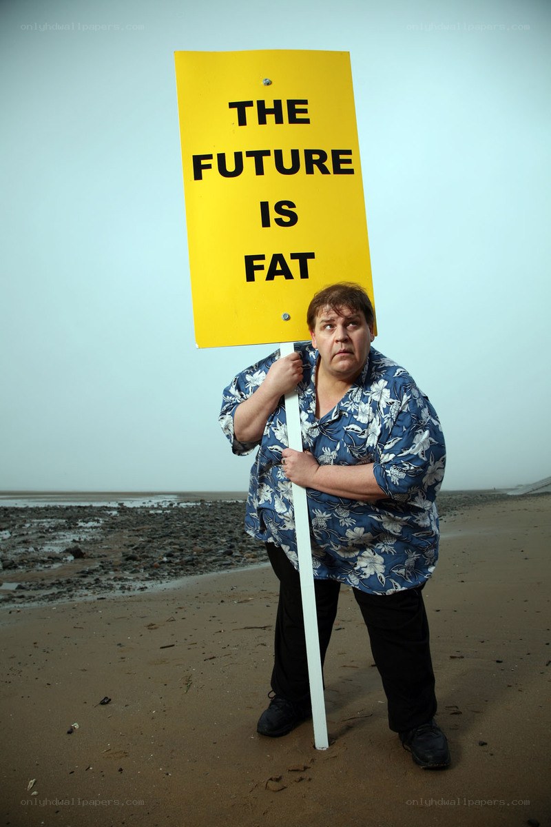 Man holding sign on beach