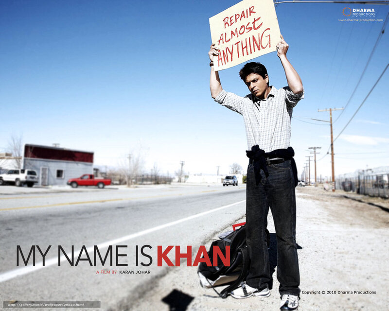 Man Holding Sign on Roadside