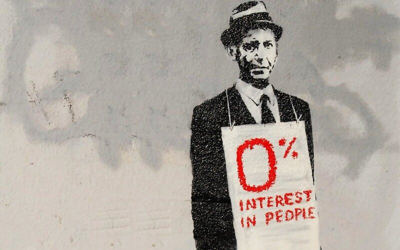 Man Holding Sign