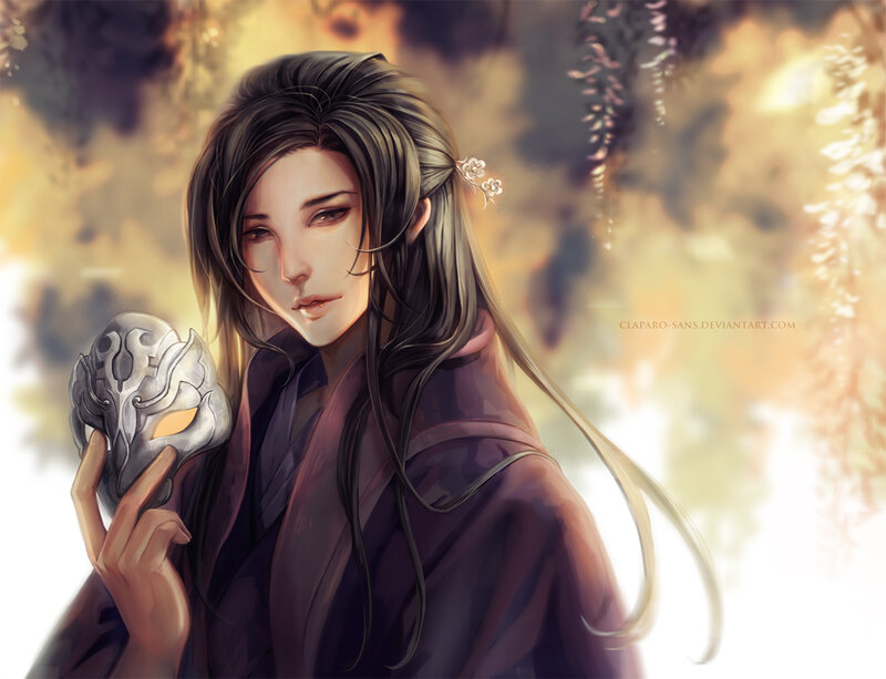 Man Holding Silver Mask