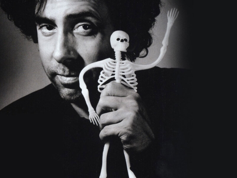 Man Holding Skeleton