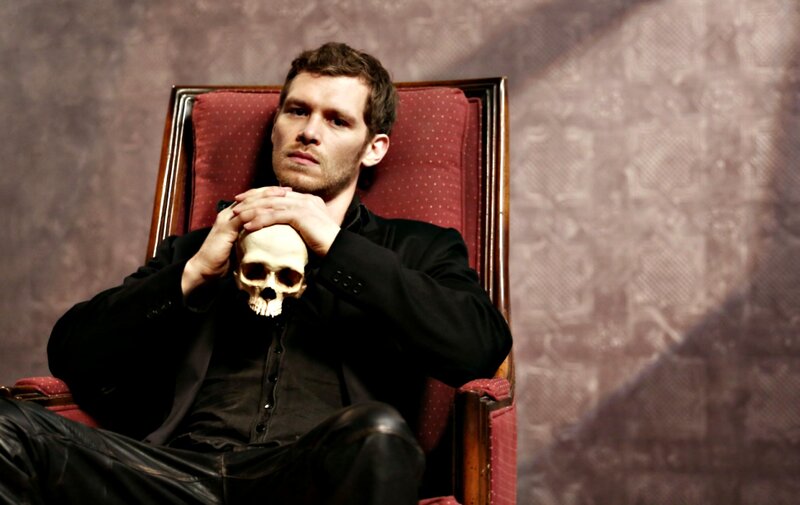 Man Holding Skull — Black