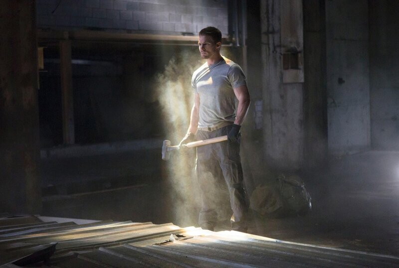 Man Holding Sledgehammer