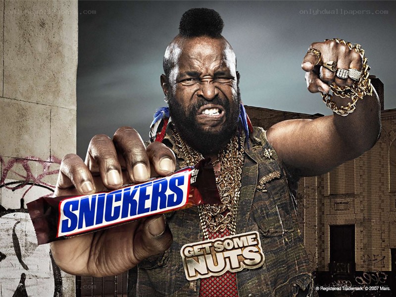 Man holding Snickers bar