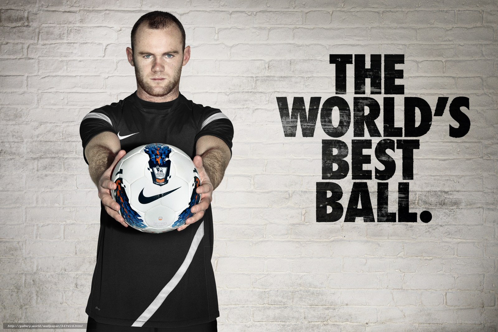 man holding soccer ball