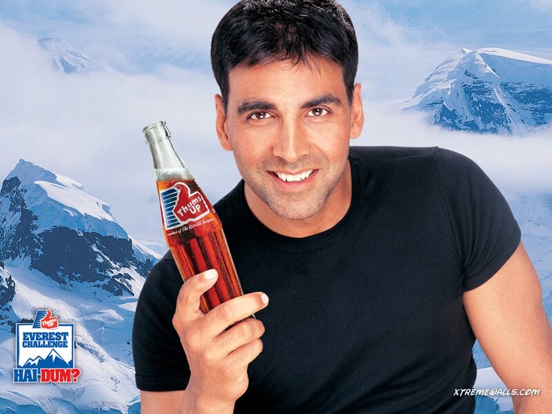 Man Holding Soda Bottle — Black