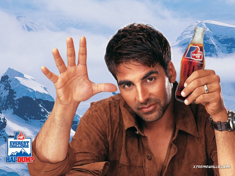 Man Holding Soda Bottle