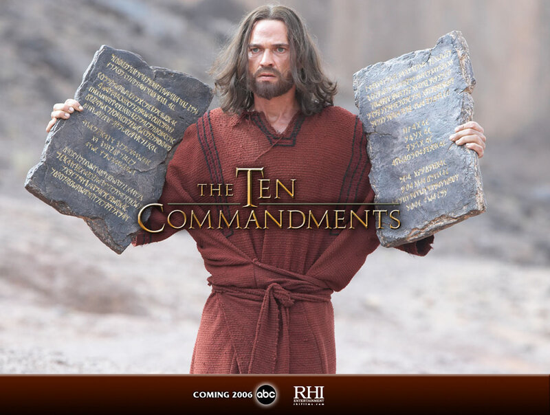 Man Holding Stone Tablets — Brown