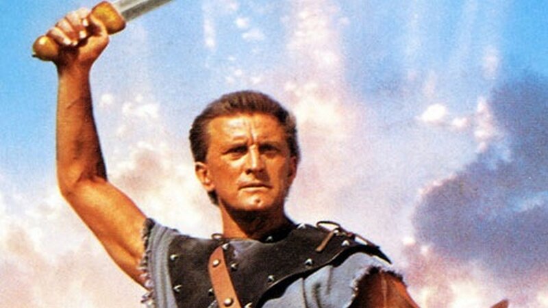 Man Holding Sword — Blue, Dramatic, Afternoon