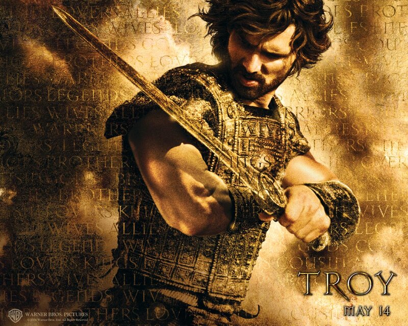 Man Holding Sword — Gold, Dramatic