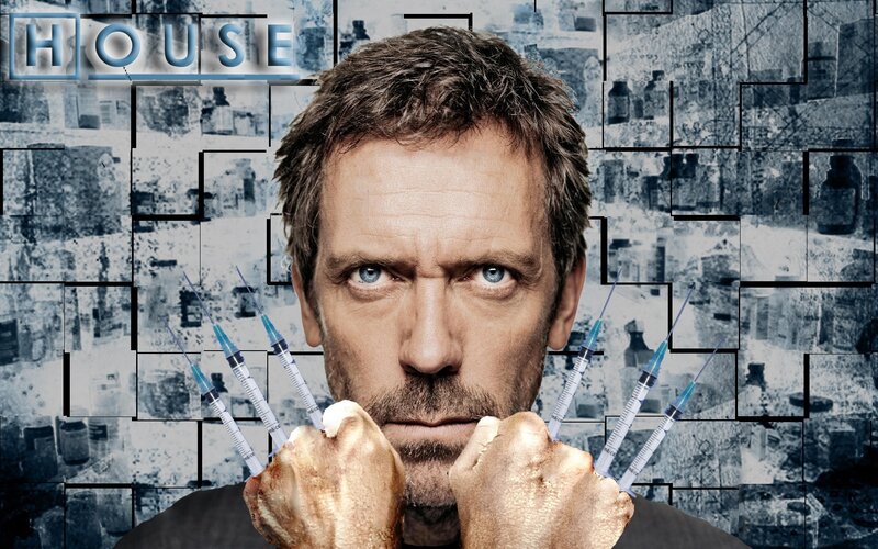 Man Holding Syringes