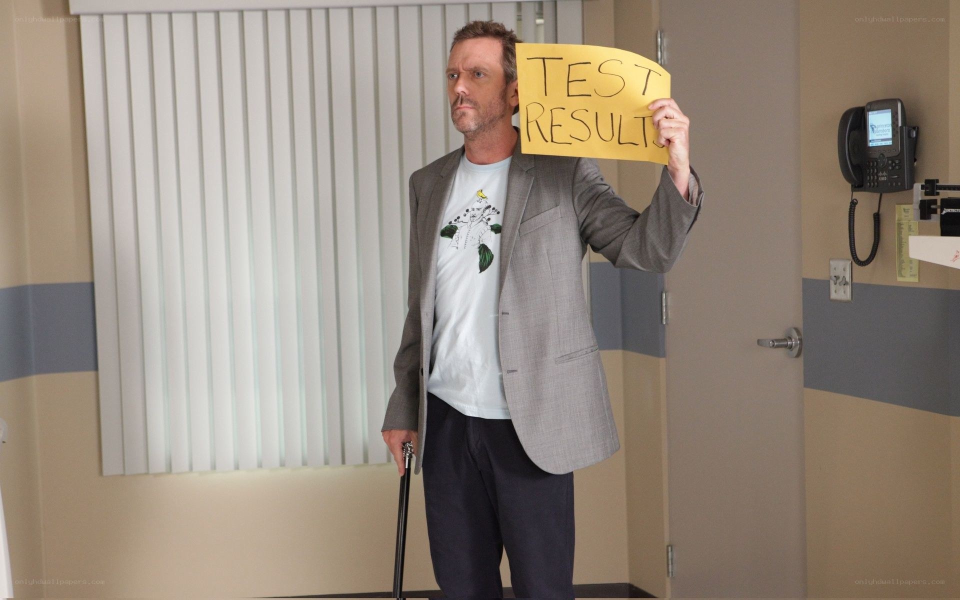 man holding test results sign