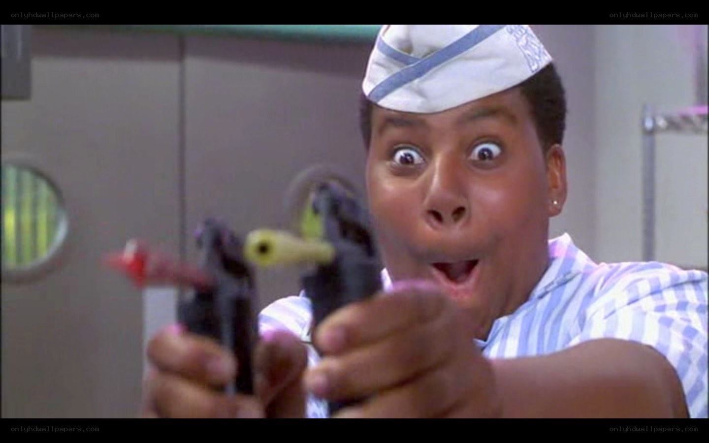 man holding toy guns
