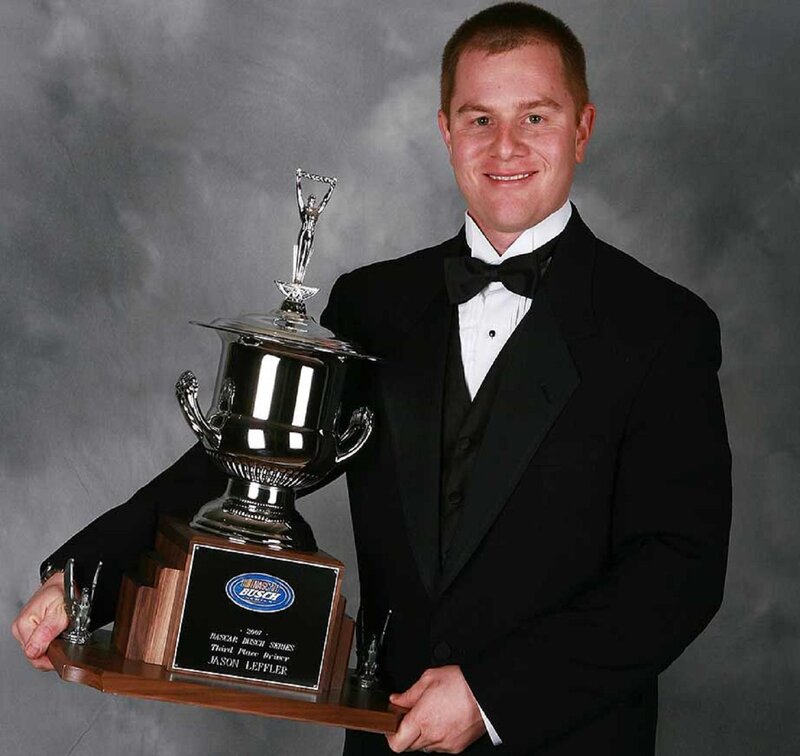 Man Holding Trophy — Black, Formal, Photograph