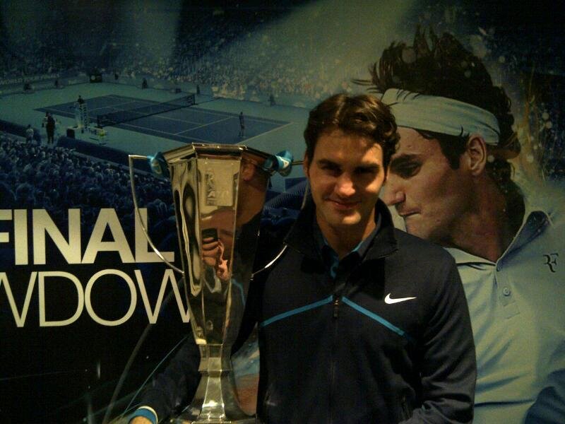 Man Holding Trophy — Black