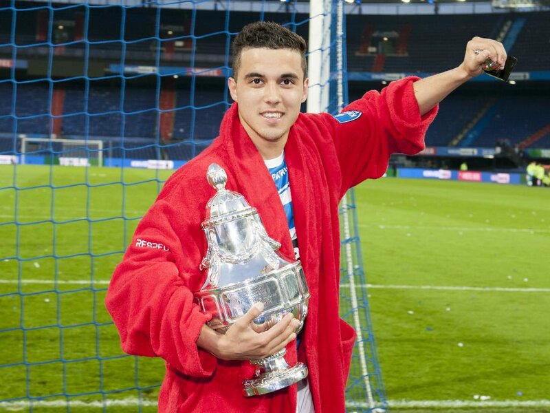 Man Holding Trophy — Red, Celebratory, Night