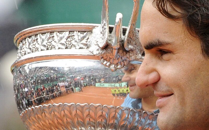Man Holding Trophy — Silver