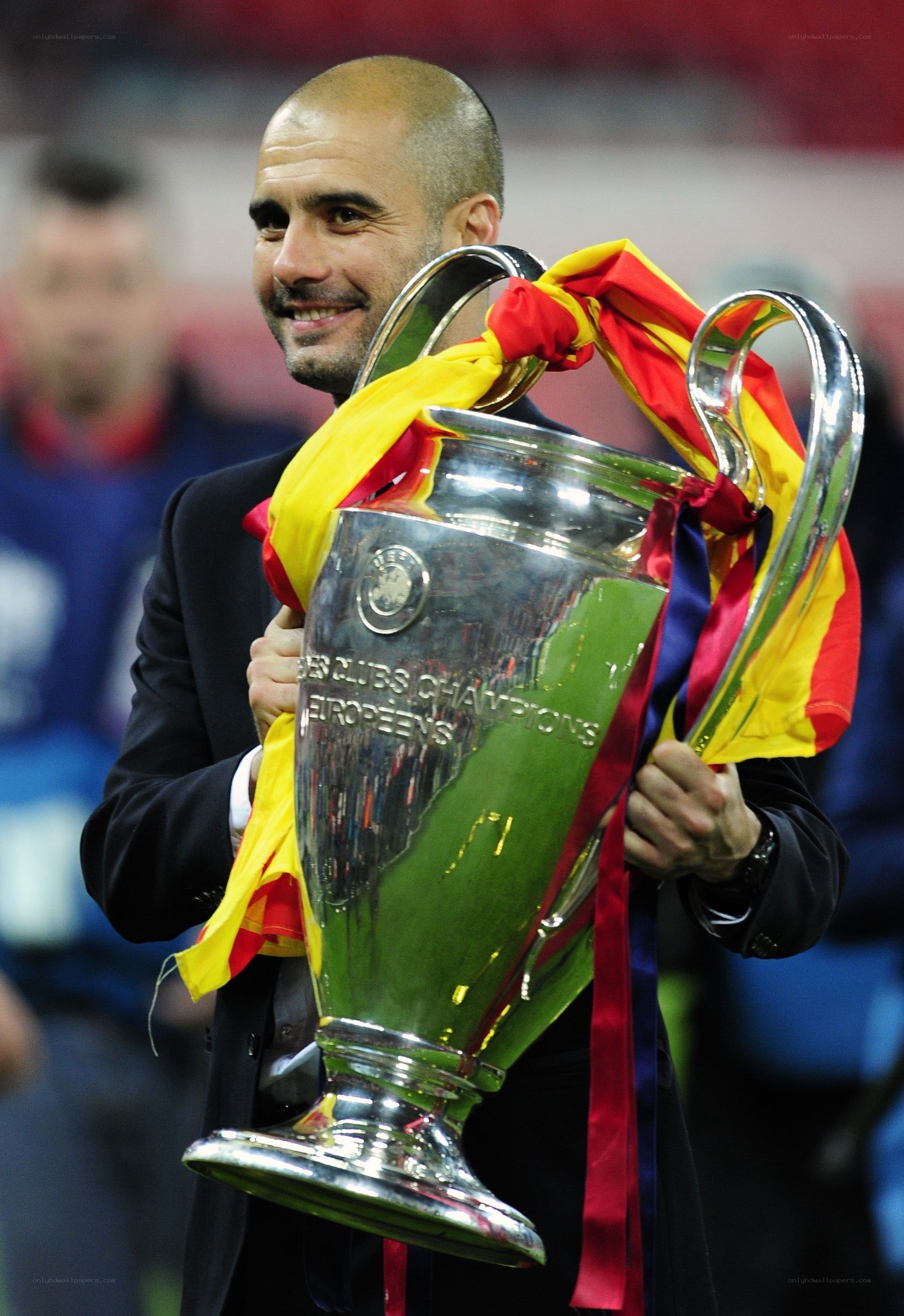 Man holding trophy with flag
