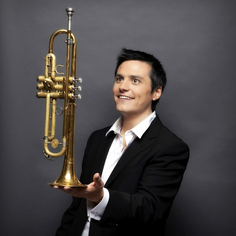Man Holding Trumpet — Black, Confident
