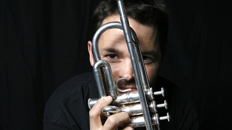 Man Holding Trumpet — Black