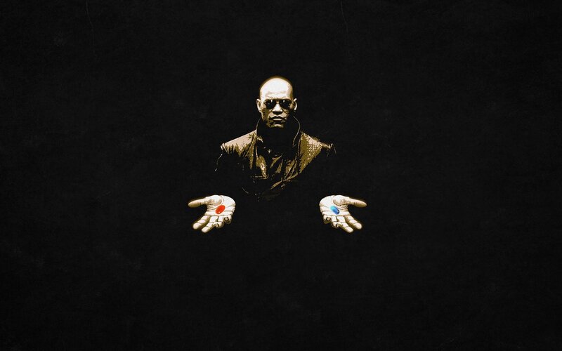 Man Holding Two Pills