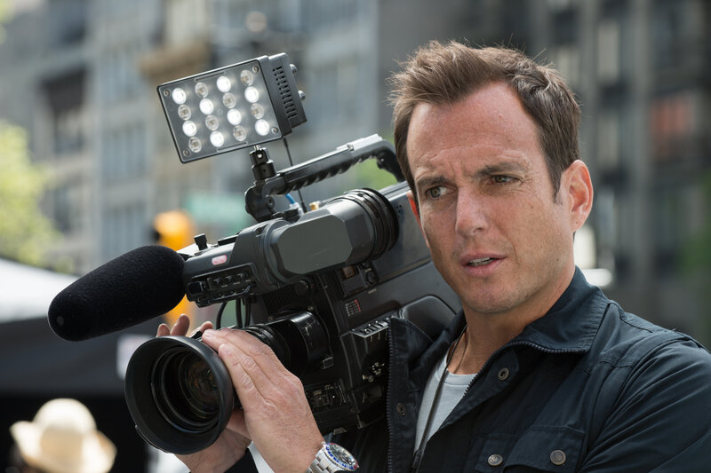 man holding video camera