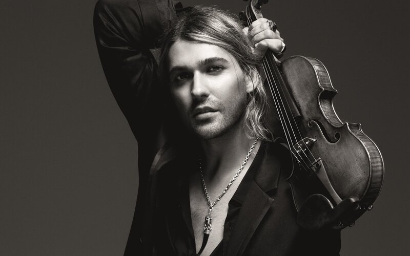 Man Holding Violin