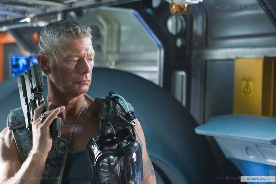 man holding weapon in spaceship