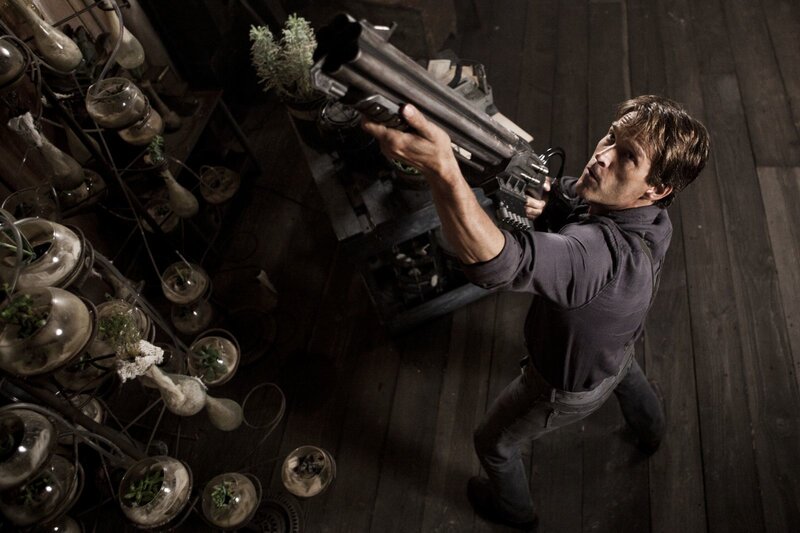 Man Holding Weapon