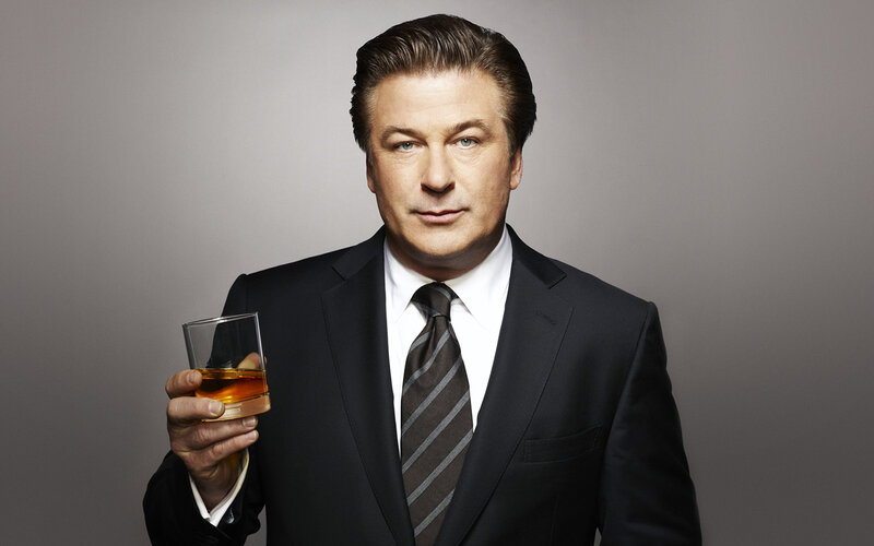 Man Holding Whiskey Glass
