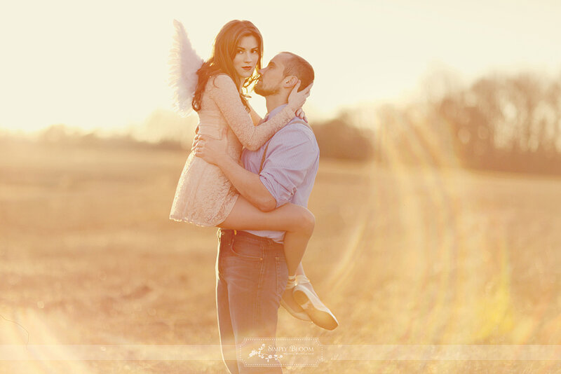 Man Holding Woman in Field