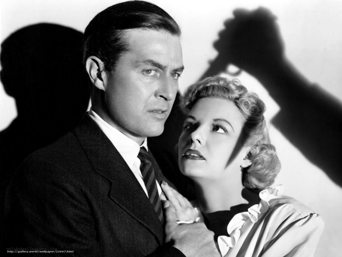 Man holding woman in suspense