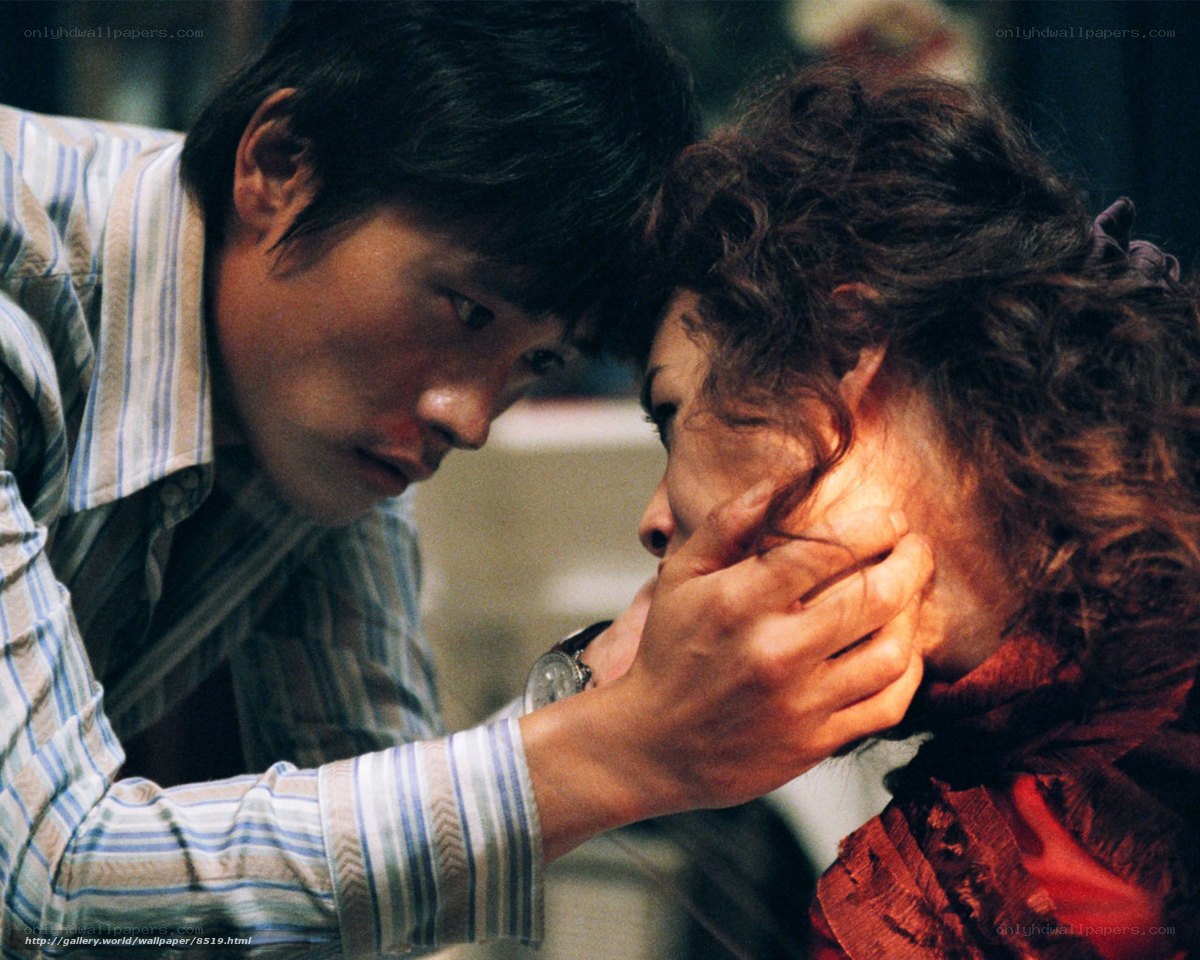 man holding woman's face