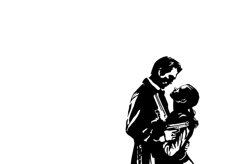 man holding woman with guns