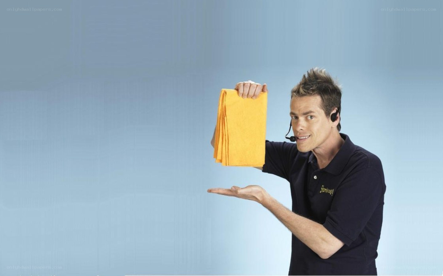 man holding yellow cloth