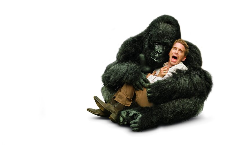 Man hugged by a gorilla