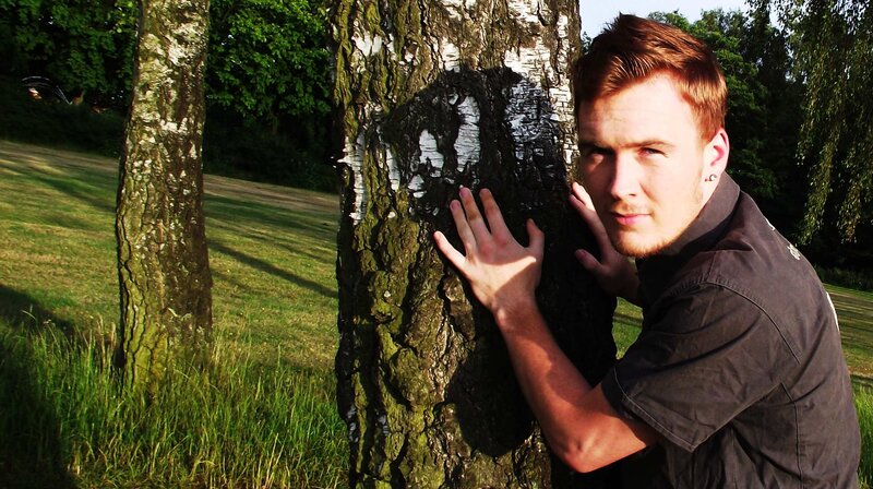 Man Hugging Tree