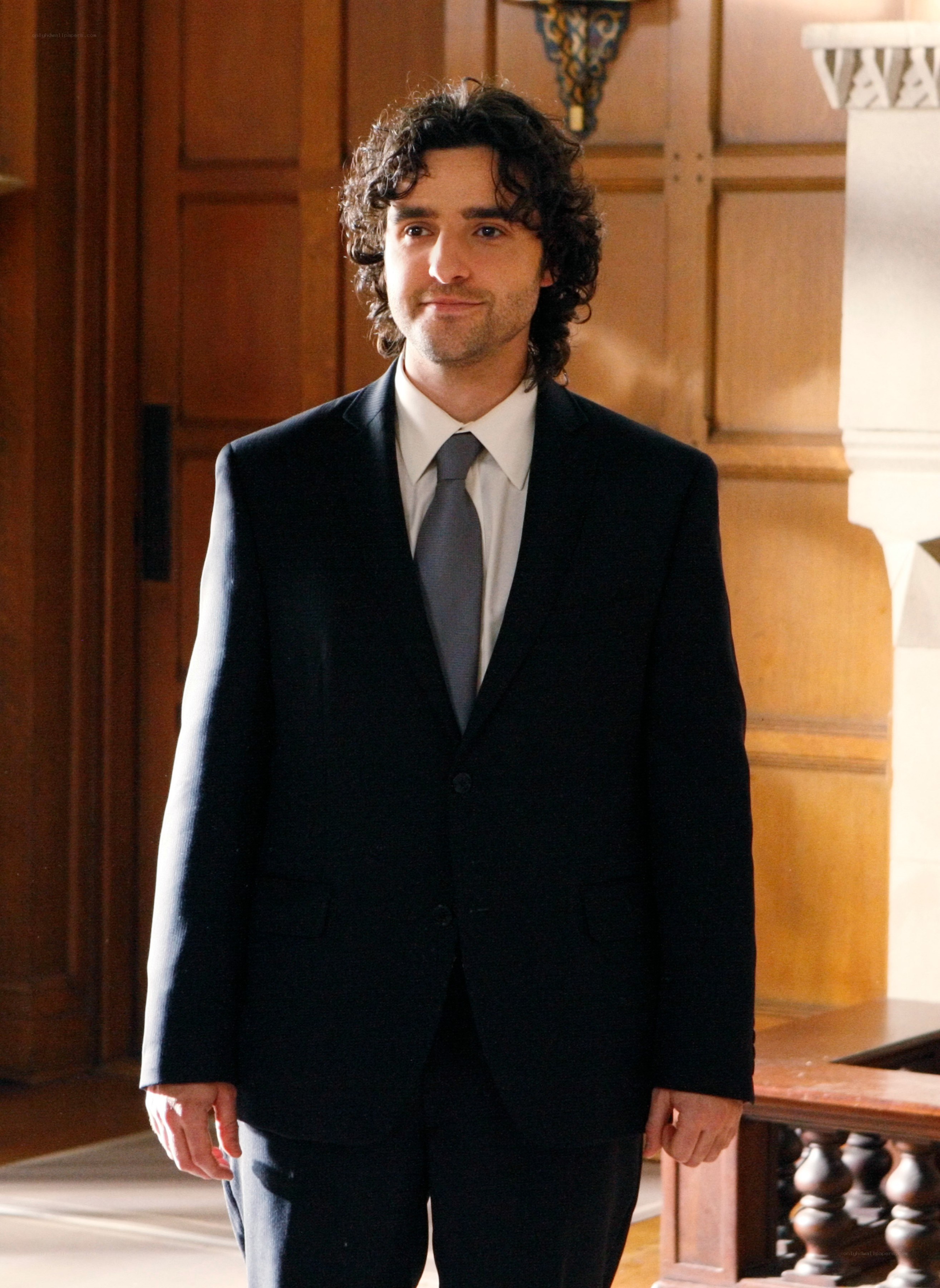 man in a black suit