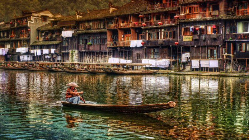 Man in a Boat — Green, Serene, Afternoon