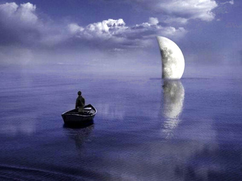 Man in a boat with moon