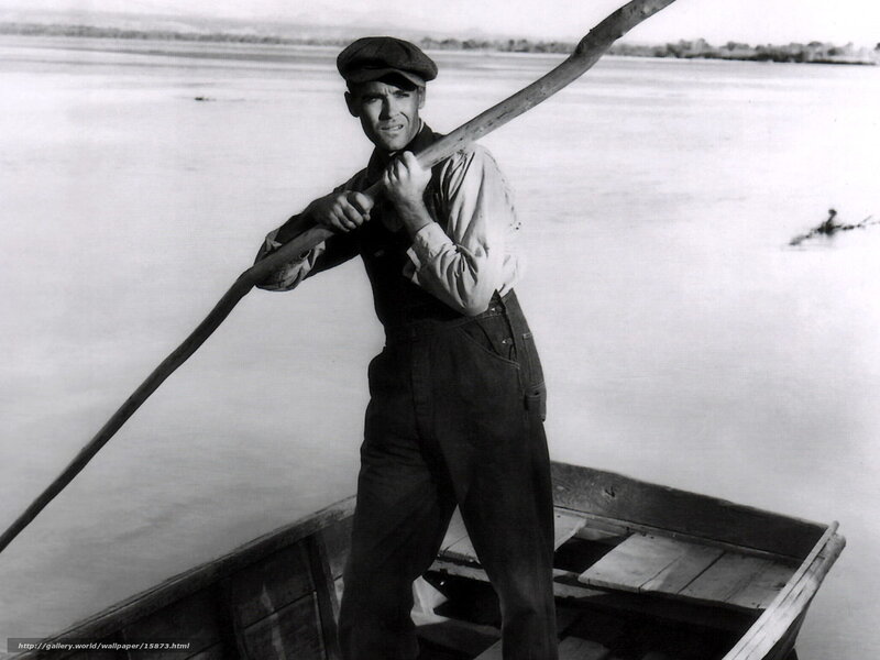Man in a boat with oar