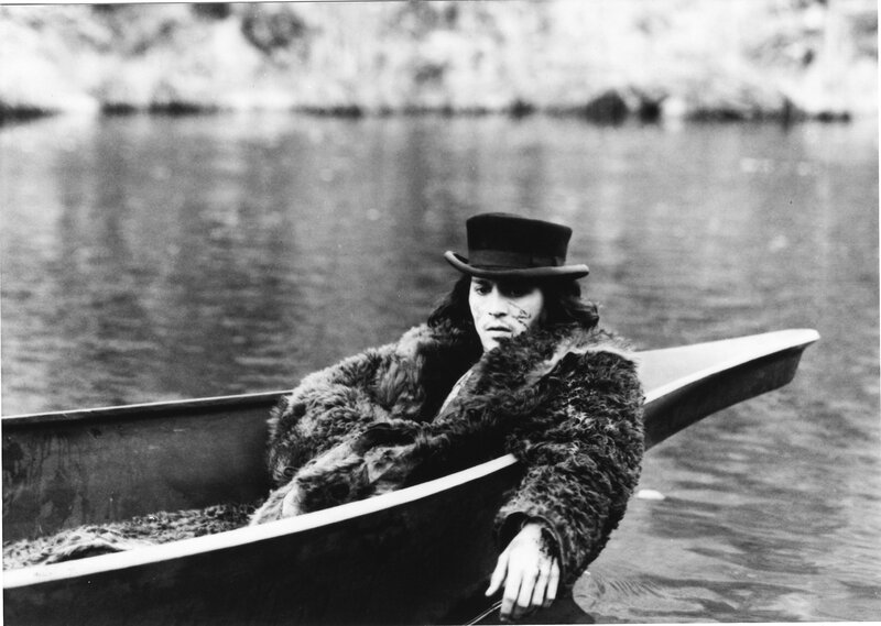 Man in a canoe on water