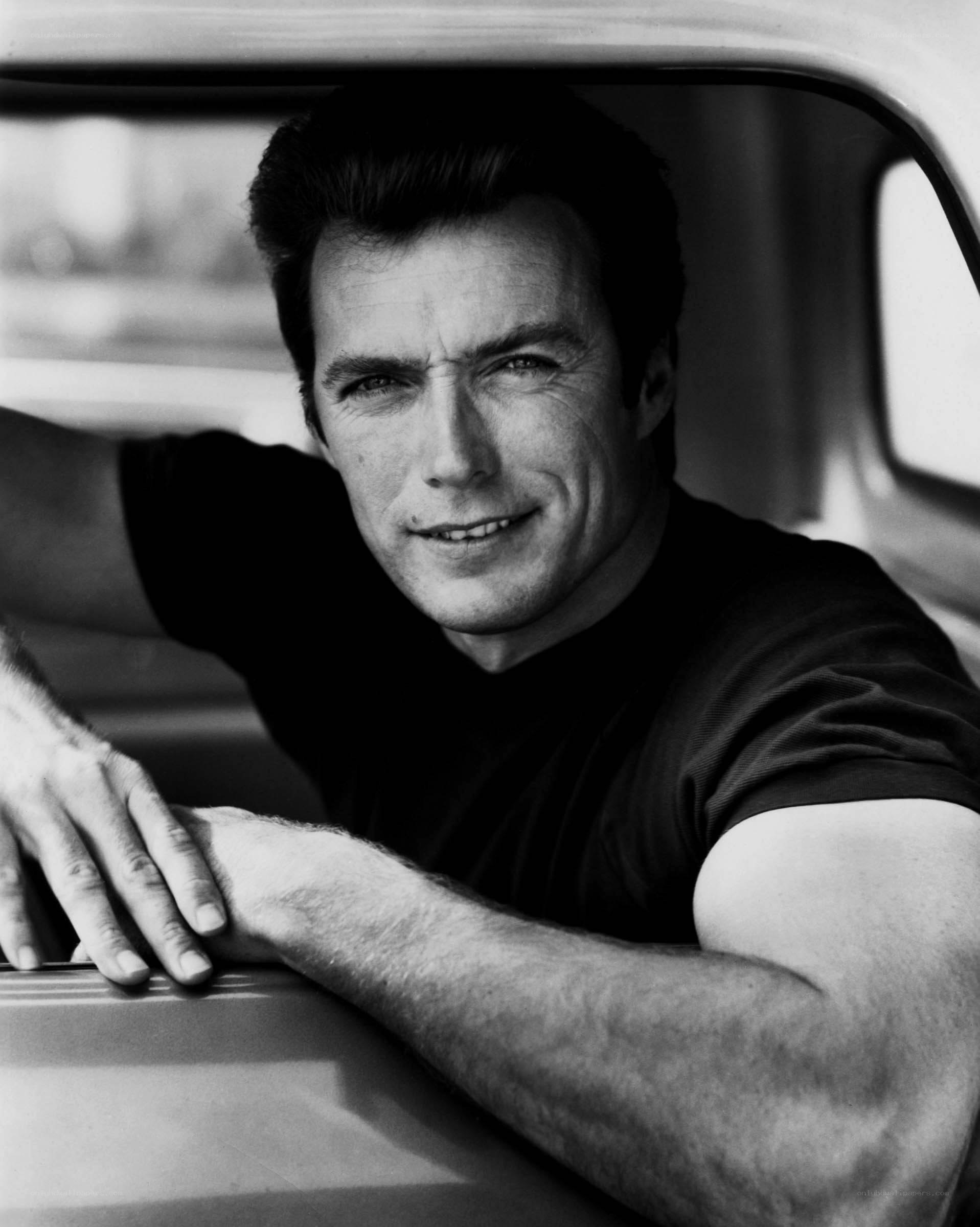 man in a car smiling