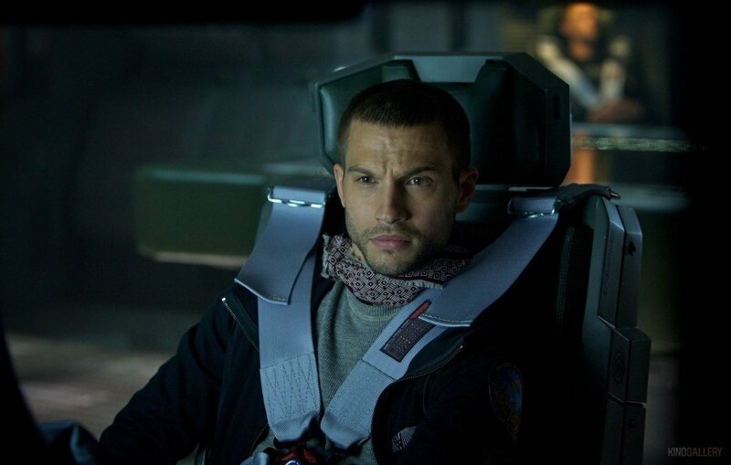 man in a cockpit seat