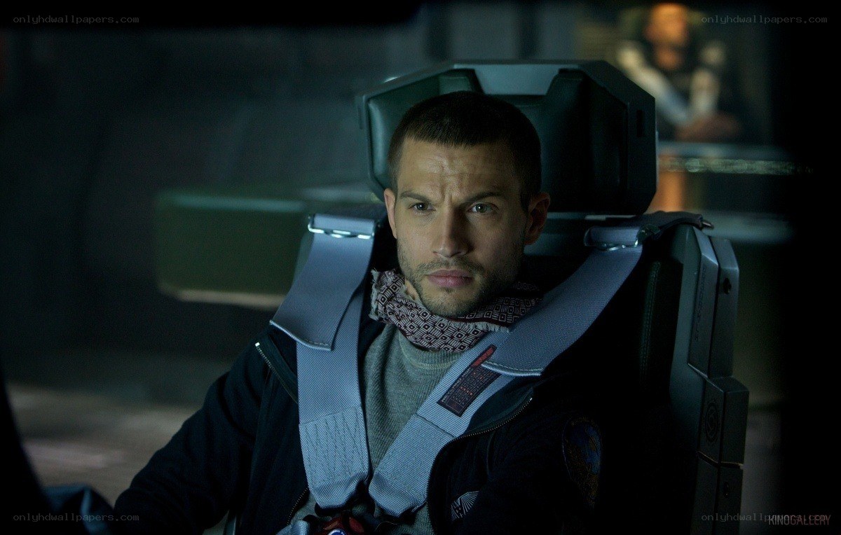 man in a cockpit seat