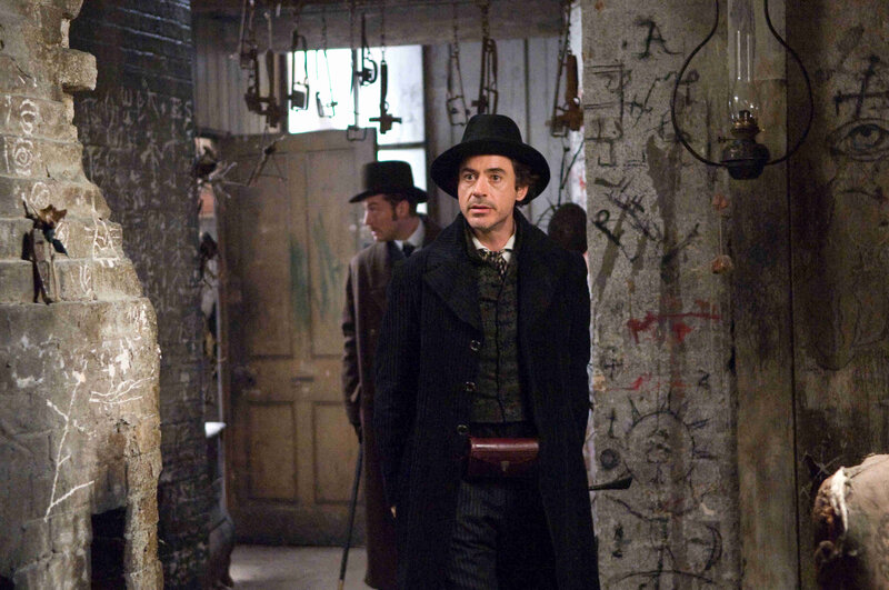 Man in a dark coat and hat