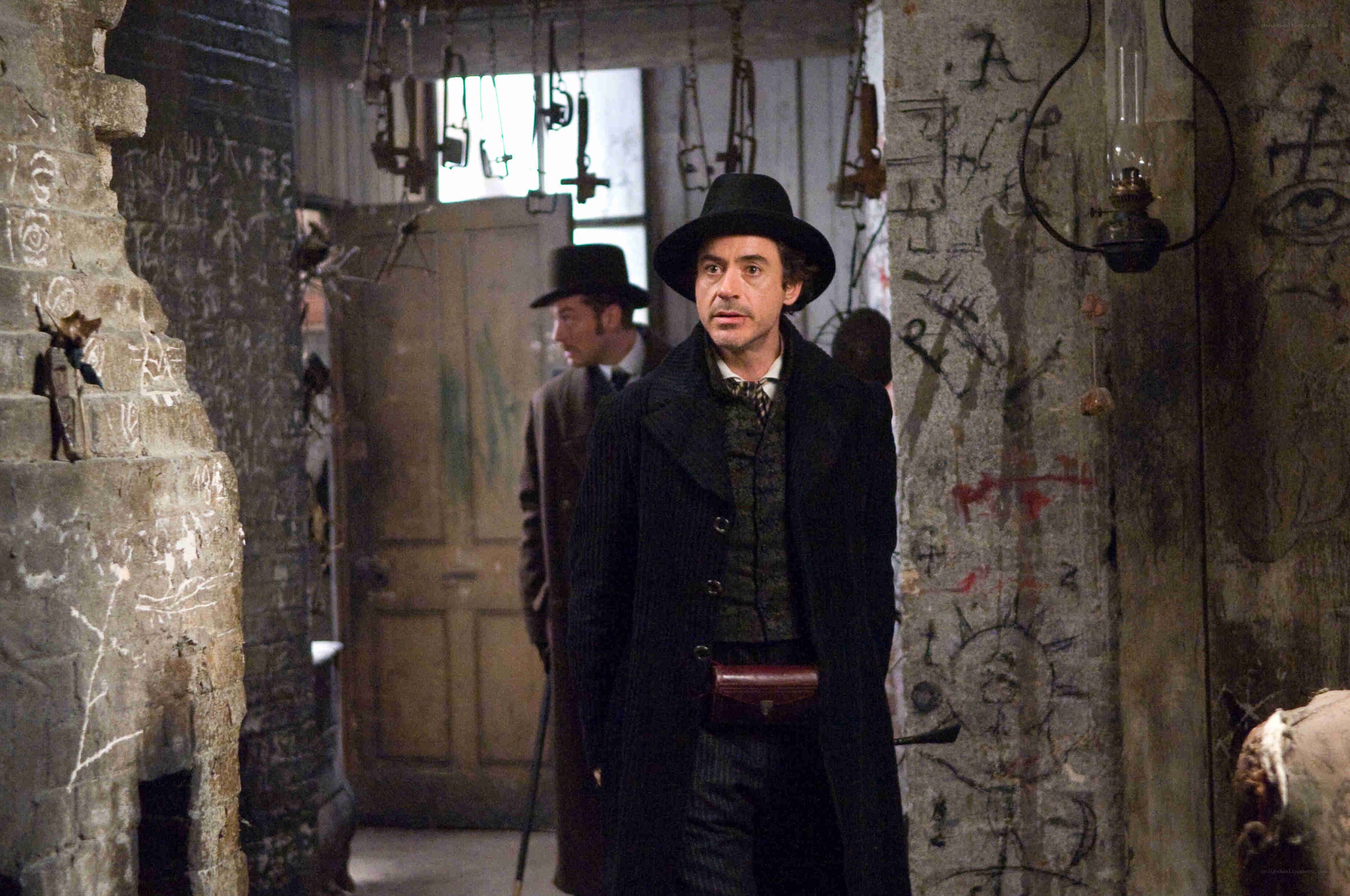Man in a dark coat and hat