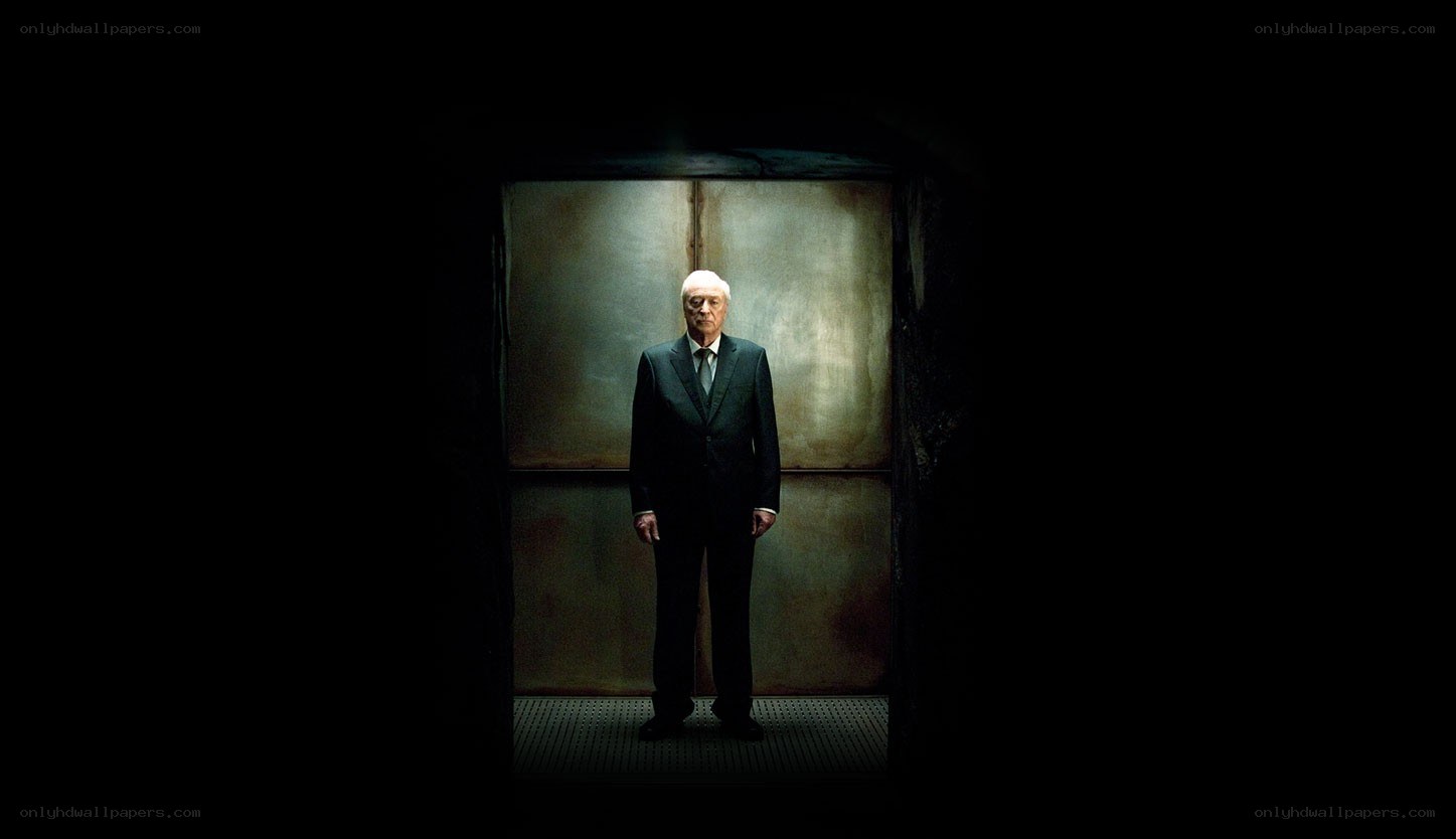 man in a dark room